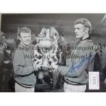 GARY SPRAKE Three B/W autographed 16 x 12 photos of the former Leeds goalkeeper, posing with the