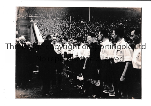 ENGLAND A hardbacked 1930 B/W photo of the England team being introduced to dignitaries before an