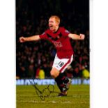 PAUL SCHOLES Autographed three colour 12 x 8 photos, showing Scholes scoring & celebrating various