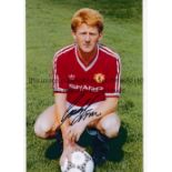 MAN UNITED Autographed thirty five b/w and colour 12 x 8 photos from the 1940s - 1990s including