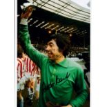 GORDON BANKS Autographed three b/w and colour 12 x 8 photos showing Banks celebrating with Stoke