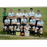 TOTTENHAM Autographed 12 x 8 colour photo showing players posing for photographers with the FA Cup