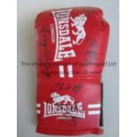 BOXING AUTOGRAPHS A red Lonsdale boxing glove signed by Tony Sibson, Bill Hardy, Ricky Burns,