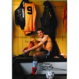 STEVE BULL AUTOGRAPHS Three 12 x 8 colour photos of the former Wolves centre-forward, all signed