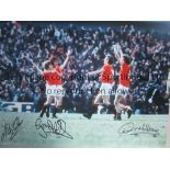 MANCHESTER UNITED AUTOGRAPHS A 16 x 12 col photo of Gordon Hill celebrating with team mates after