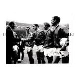 MANCHESTER UNITED A 10" X 8" b/w photo of Prince Charles shaking Bill Foulkes hand before the 1963