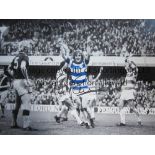 STAN BOWLES AUTOGRAPH A 16 x 12 colorized photo of Bowles raising his arms aloft in celebration