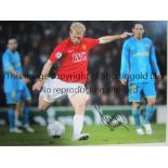 PAUL SCHOLES AUTOGRAPHS Three 16 x 12 photographs 2 x col 1 x colorized of the former Man United