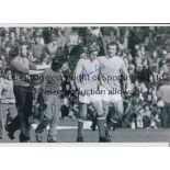 DENIS LAW Autographed 12 x 8 b/w photo of Manchester City's Mike Summerbee trying to get a