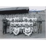 HUGH CURRAN Autographed 12 x 8 b/w photo of Millwall's squad of players posing for photographers
