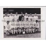 MILLWALL / PRESS PHOTO A 10" X 8" b/w team group from July 1969 with stamp on the reverse. Good