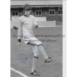 PETER KNOWLES Autographed 12 x 8 b/w photo of the Wolves centre-forward striking a full length