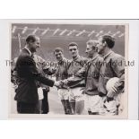 MANCHESTER UNITED A 10" X 8" b/w Press photo, with stamp and paper notation on the reverse of the