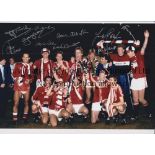 MAN UNITED Autographed 12 x 8 col photo of players celebrating with the FA Cup in front of