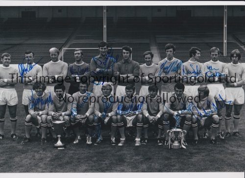 MANCHESTER CITY Autographed 12 x 8 b/w photo of players posing at Maine Road with silverware won