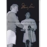 DENIS LAW Autographed 12 x 8 b/w photo of the Man United striker congratulating Benfica's Eusebio