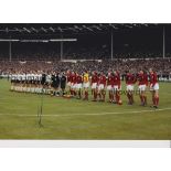 HANS TILKOWSKI Autographed 12 x 8 col photo of both the West German and England teams lining up