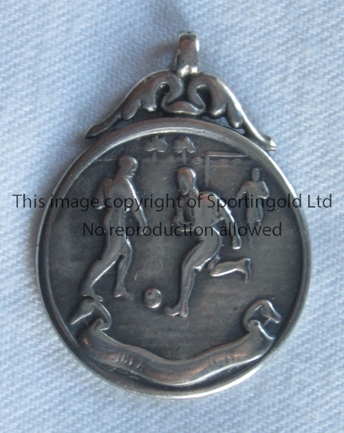 STERLING SILVER FOOTBALL MEDAL 1916 Medal with a football scene on one side and on the other is