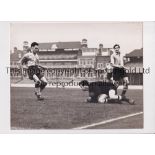 PRESS PHOTOS / FOOTBALL AT THE OVAL 1958 Two original B/W Press photos with stamps and paper