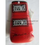 MUHAMMAD ALI SIGNED BOXING GLOVE A red Ringside Product boxing glove signed by Muhammad Ali with