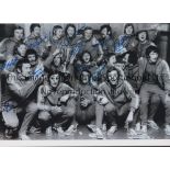 RANGERS Autographed 12 x 8 b/w photo of players celebrating in the dressing room at the Nou Camp