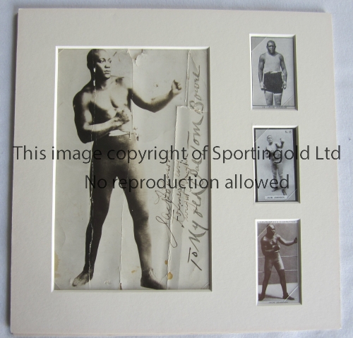 JACK JOHNSON / AUTOGRAPH An original 8" X 5" black & white photo showing Johnson in boxing pose.