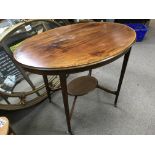 An Edwardian inlaid mahogany side table, the under