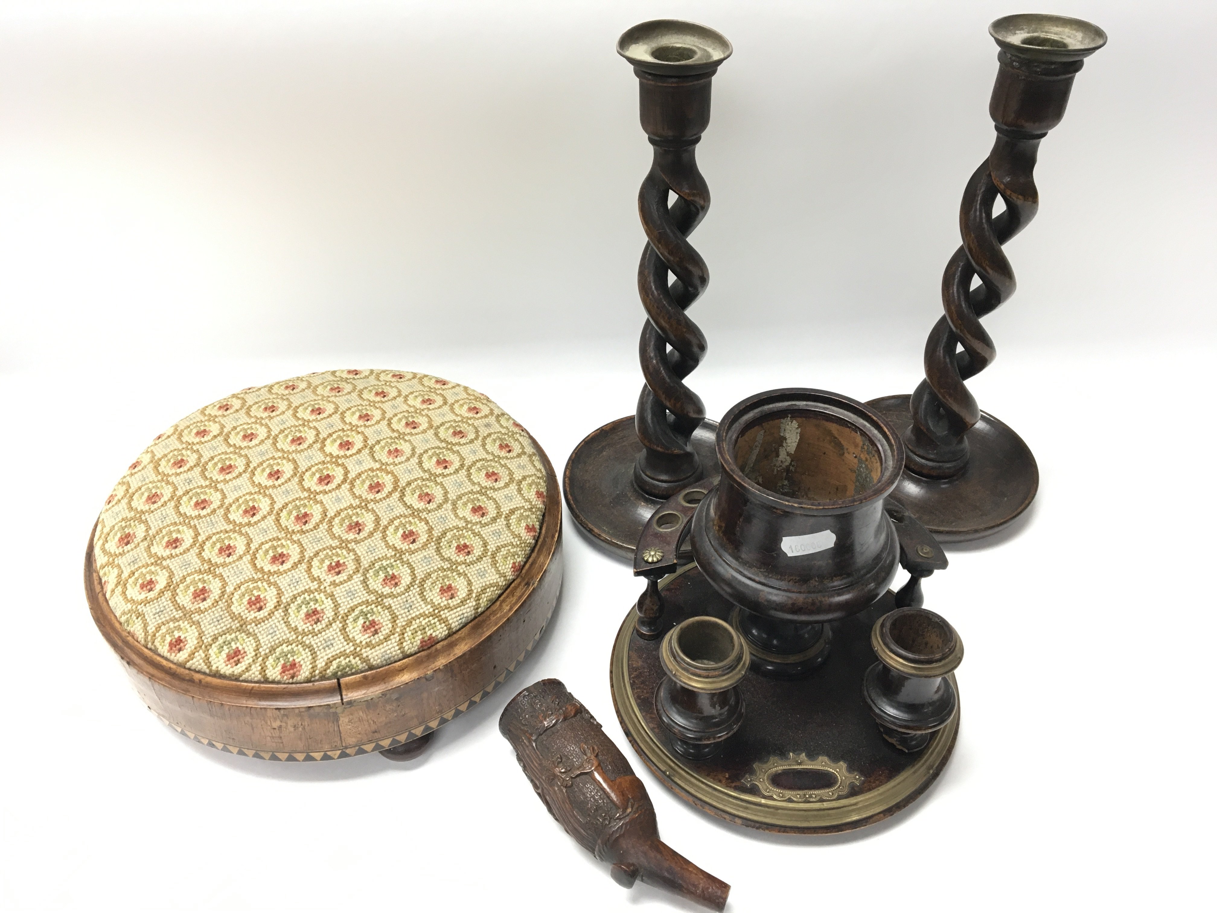 A pair of oak barley twist candle sticks a stool a