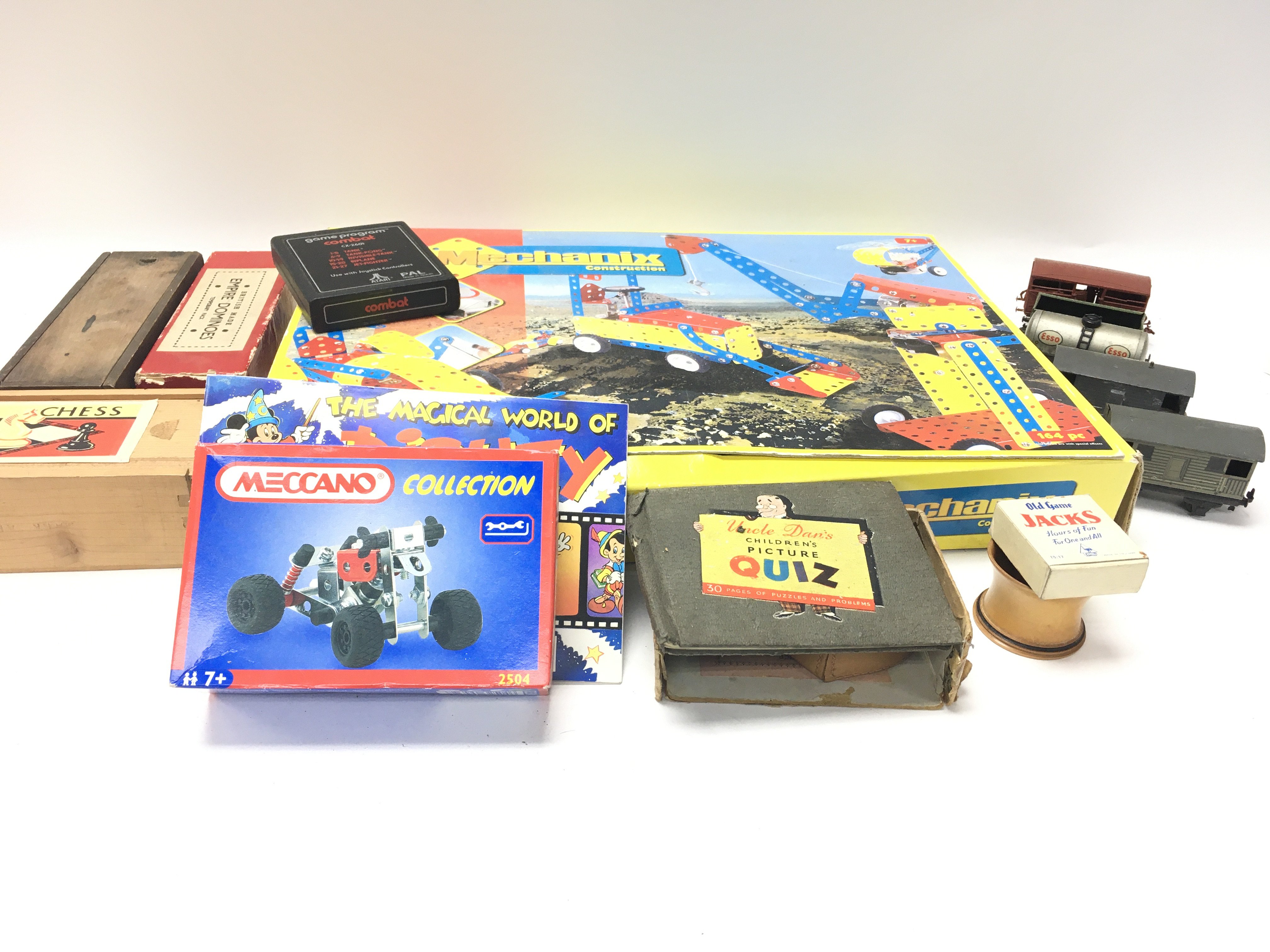 A collection of games including Meccano, dominos,