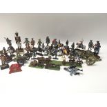 A collection of various plastic and lead soldiers.