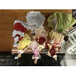 8 Royal Doulton porcelain lady figurines.