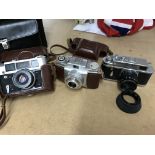 3 vintage cameras including a Russian Zorki 4K.