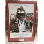 A framed and glazed signed Martin Johnson photo display, approx 57cm x 79cm.