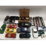 A collection of die cast vehicles and trains inclu