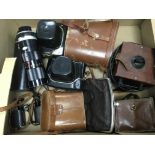 A box of items comprising mainly cameras. NO RESER