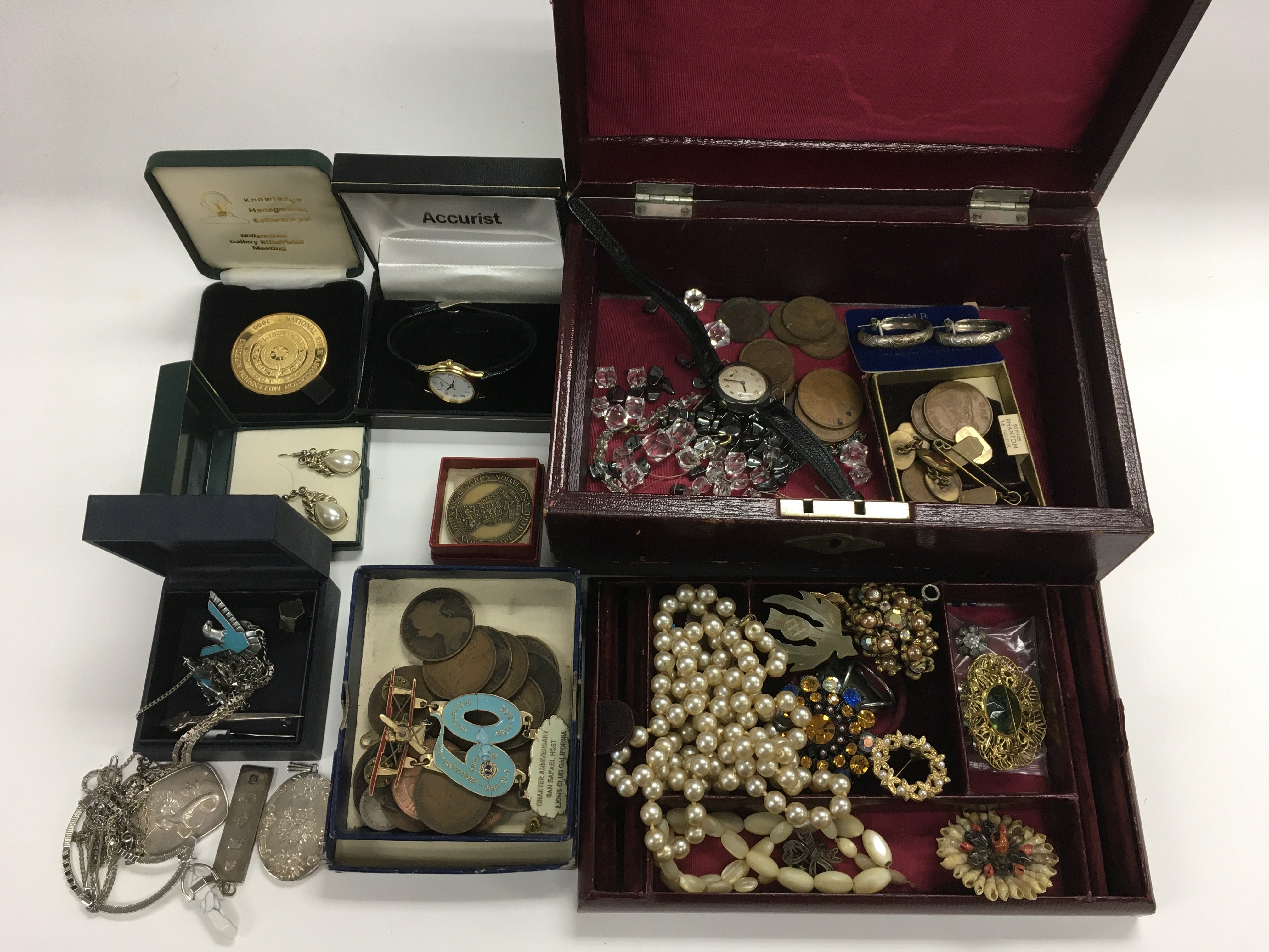 A collection of costume jewellery and coins. NO RE