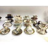 A collection (20) porcelain coffee cans, cups and