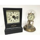 A brass cased 400 day anniversary type clock under