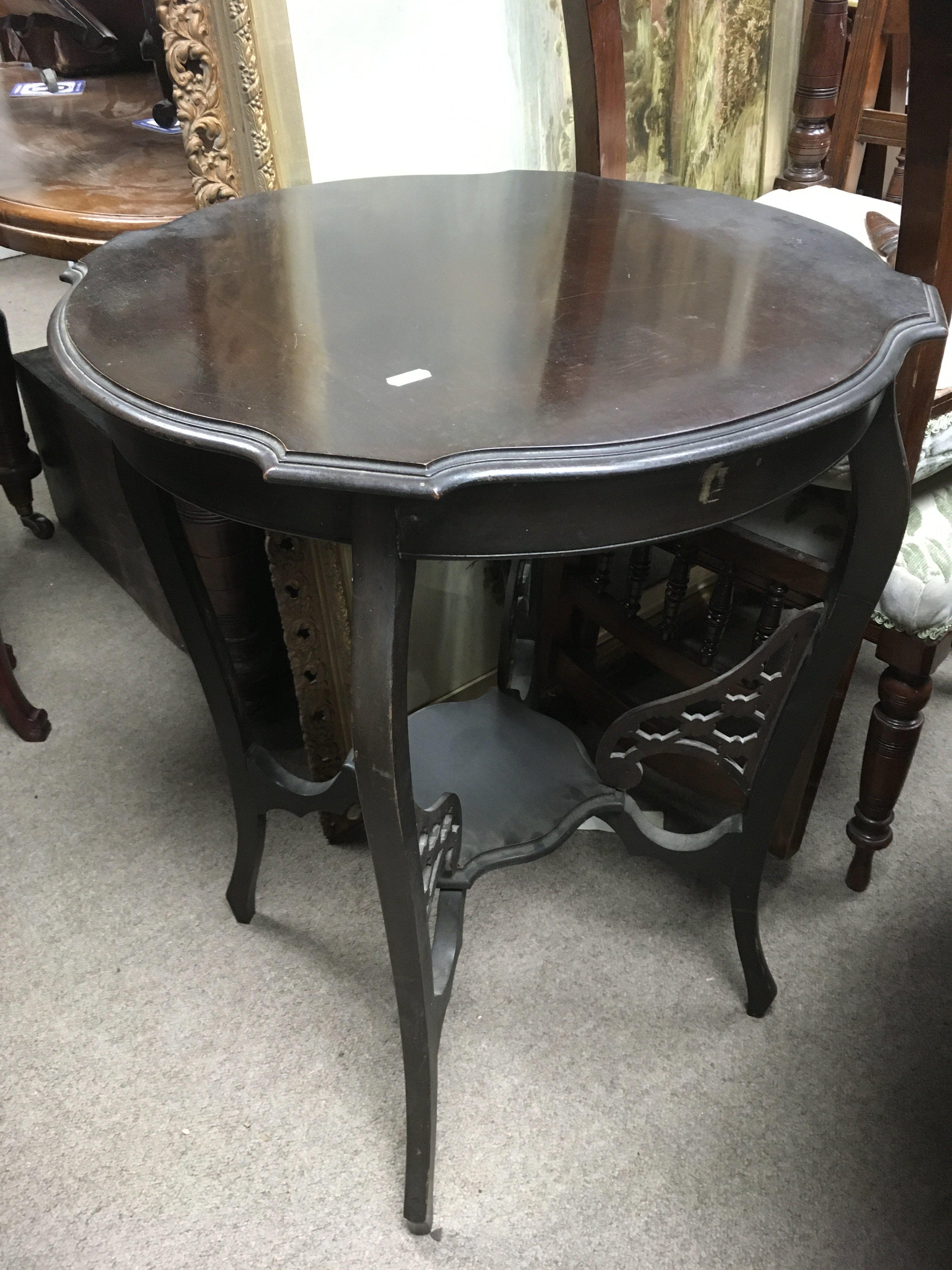 A mahogany occasional table with fretwork supports - NO RESERVE