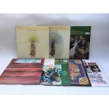 A collection of LPs including Nicky Hopkin, John Sebastian, Paul McCartney, and The Beach Boys