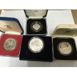 A 2008 1 ounce silver American one dollar and 3 En