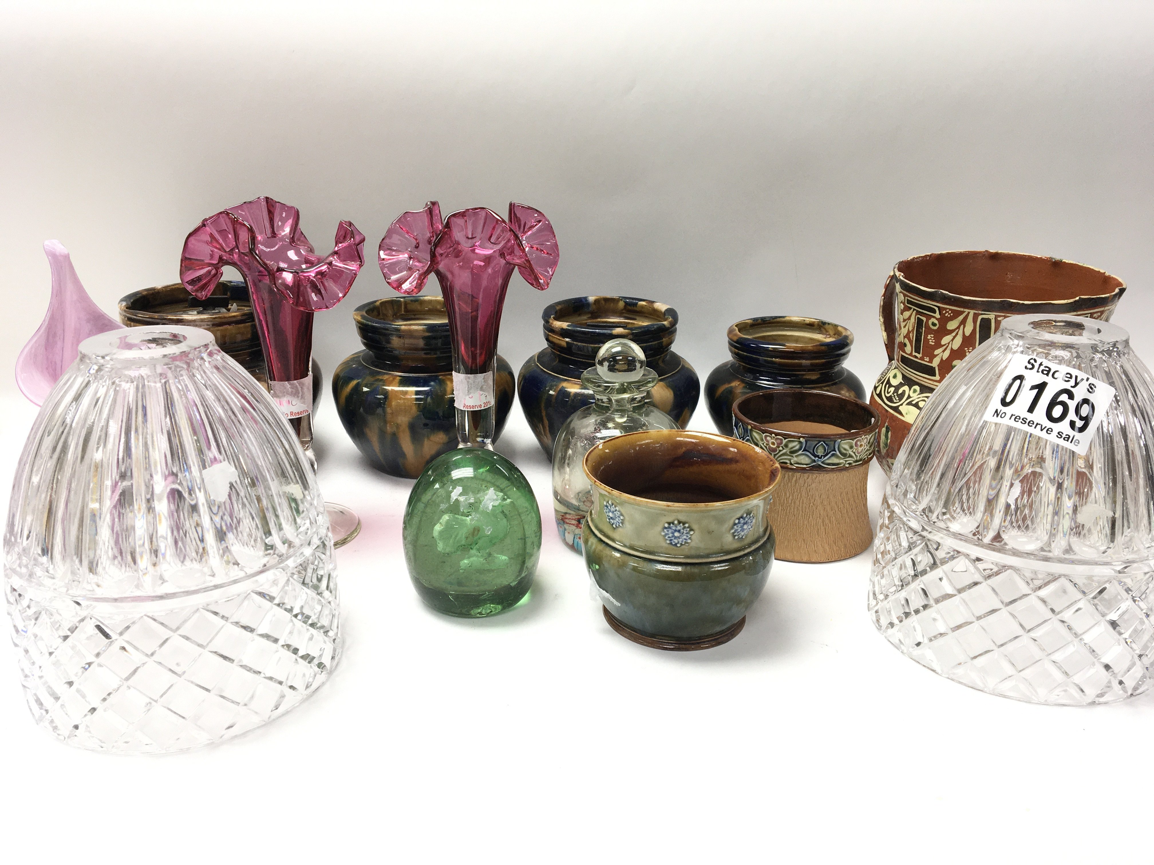 A collection of ceramics and glass with stoneware