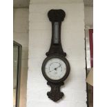 An oak cased wall barometer. NO RESERVE.