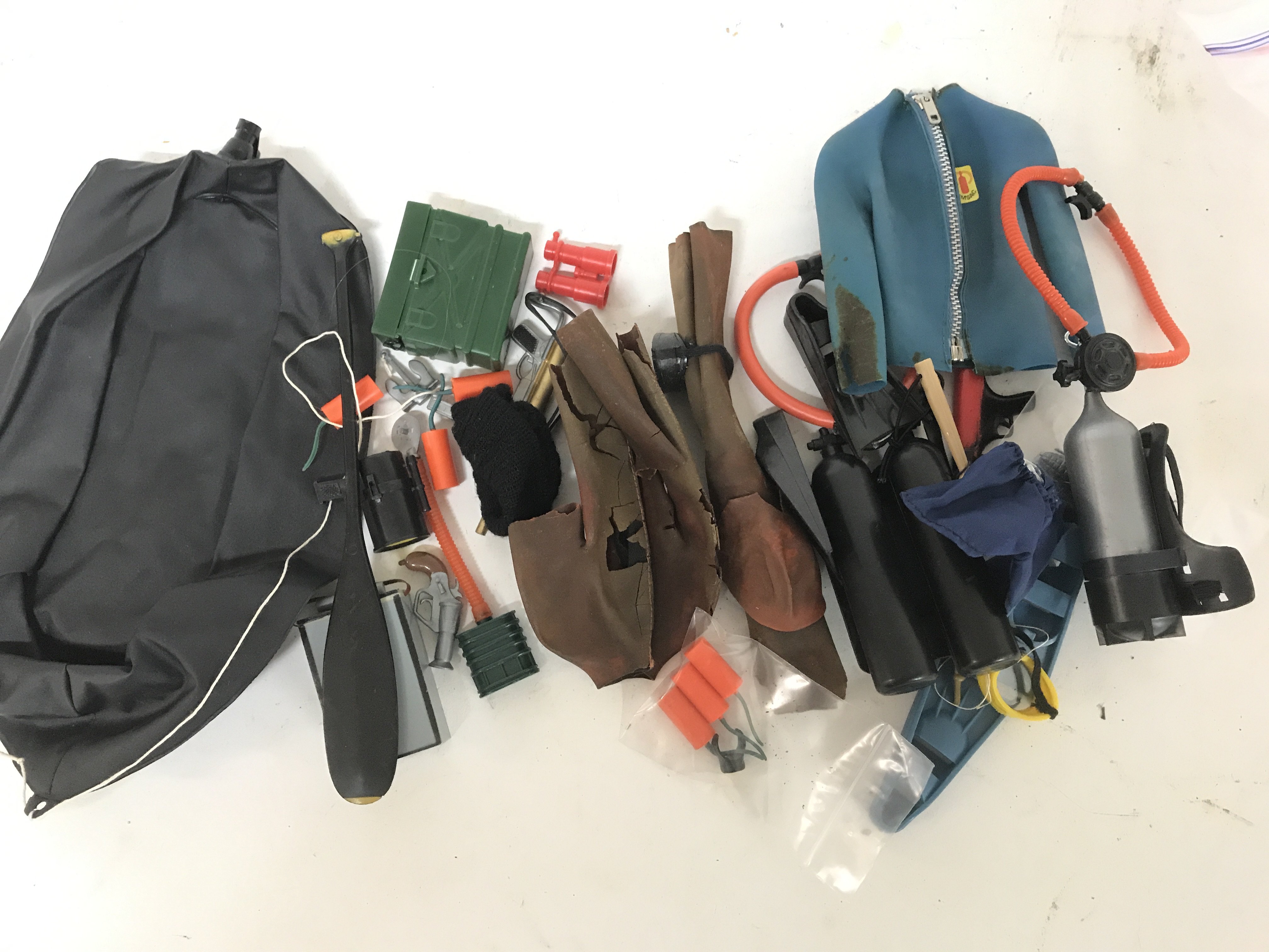 A collection of Action Man accessories including s