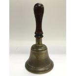 A vintage school hand bell.