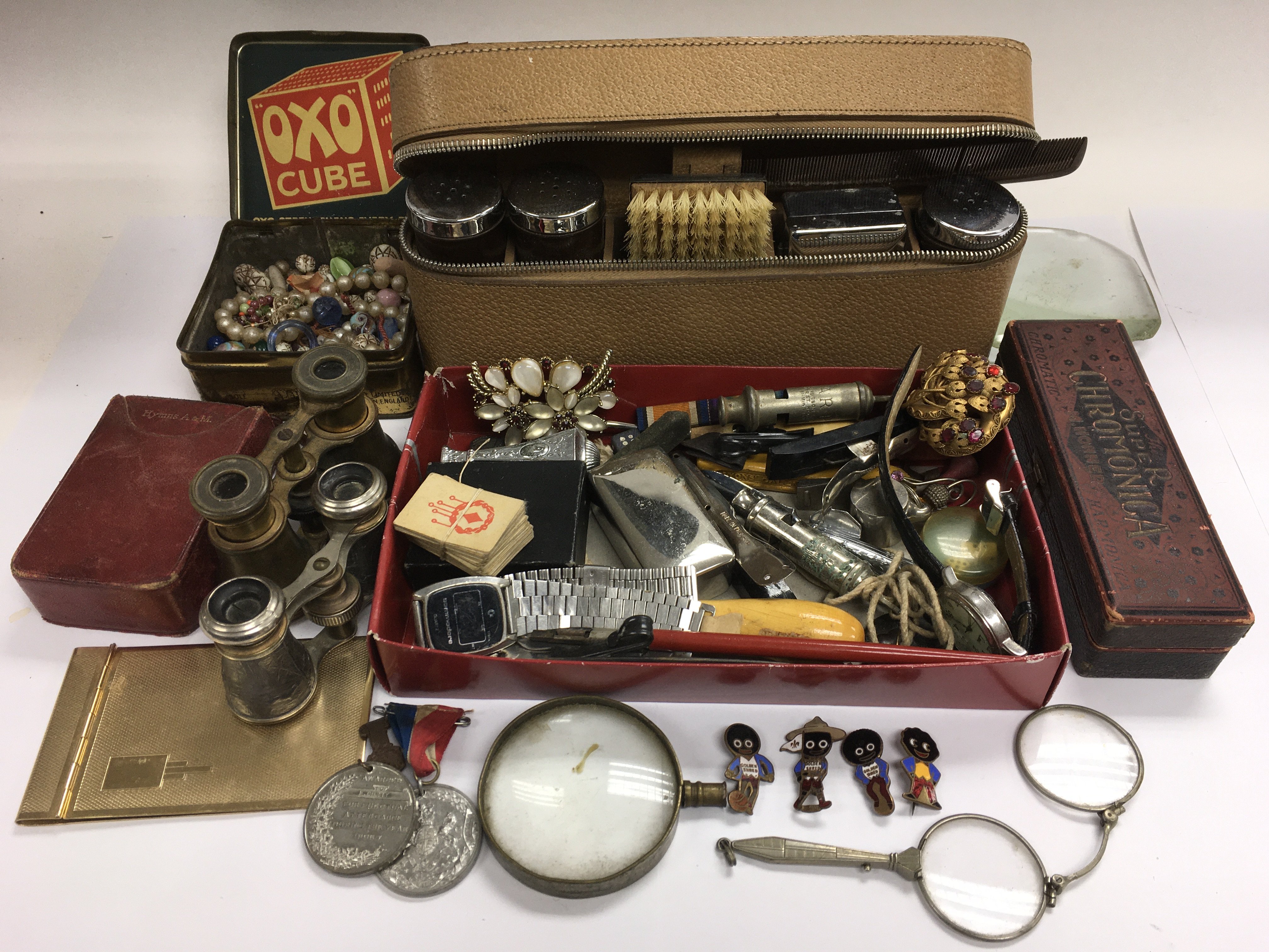 A collection of oddments including a lorgnette, tr