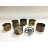 A collection of brass Trench Art shell cases with