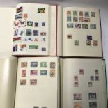 A group of four world stamp albums from the 19th c