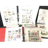 4 folders of stamps from around the world.NO RESER