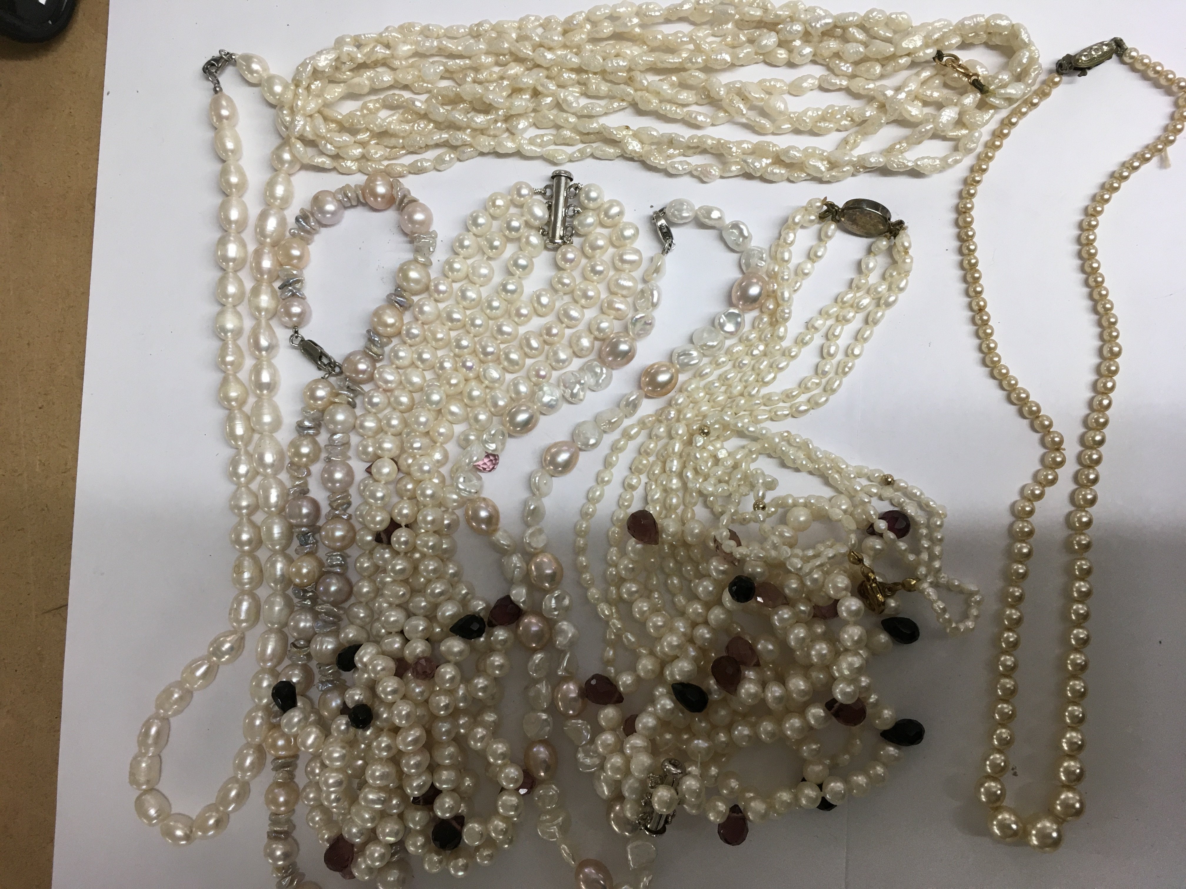 A collection of pearl necklaces and bracelets (9).